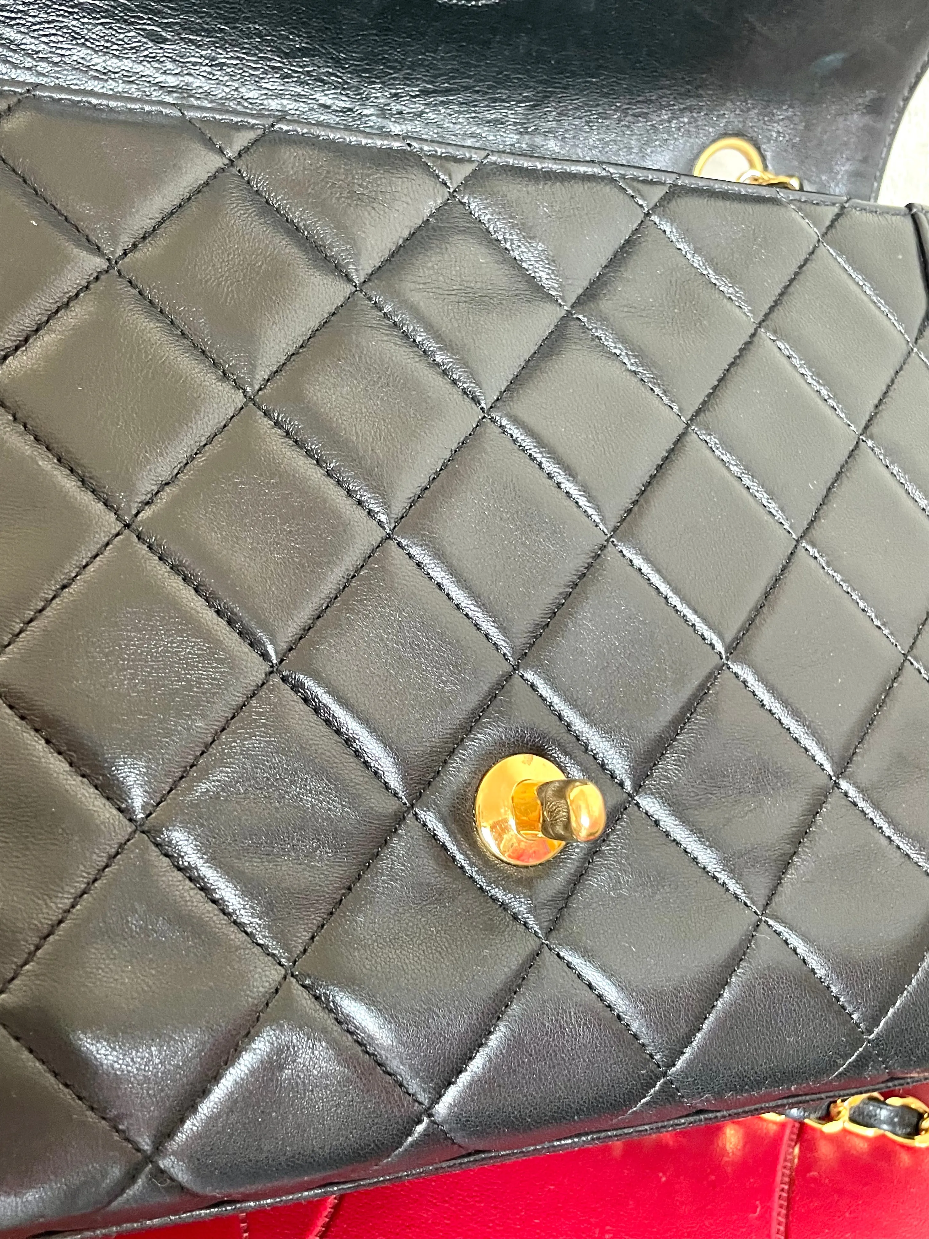 Vintage Chanel black lambskin chain 2.55 shoulder bag with gold chain. Unique hexagon shaped flap. 0407012